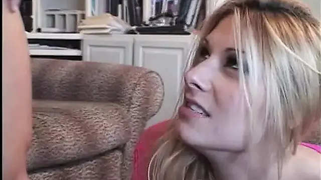 Cute blonde double penetrated by two guys on the sofa