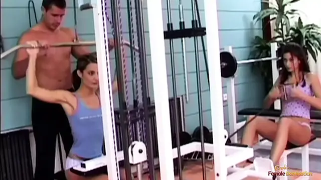 In a passionate threesome, a gym teacher is gratifying the desires of two slender brunettes