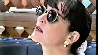 Her lovely tits take a brutal pounding from two gigantic penises