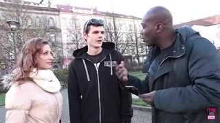 Exploring the city, they stumble upon a black man with a massive pole