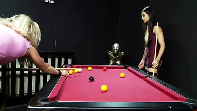 Young blonde and brunette take turns sucking a guy's cock