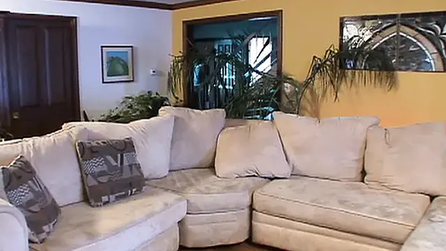 Darryl Hanah enjoys two hard cocks in a hot threesome